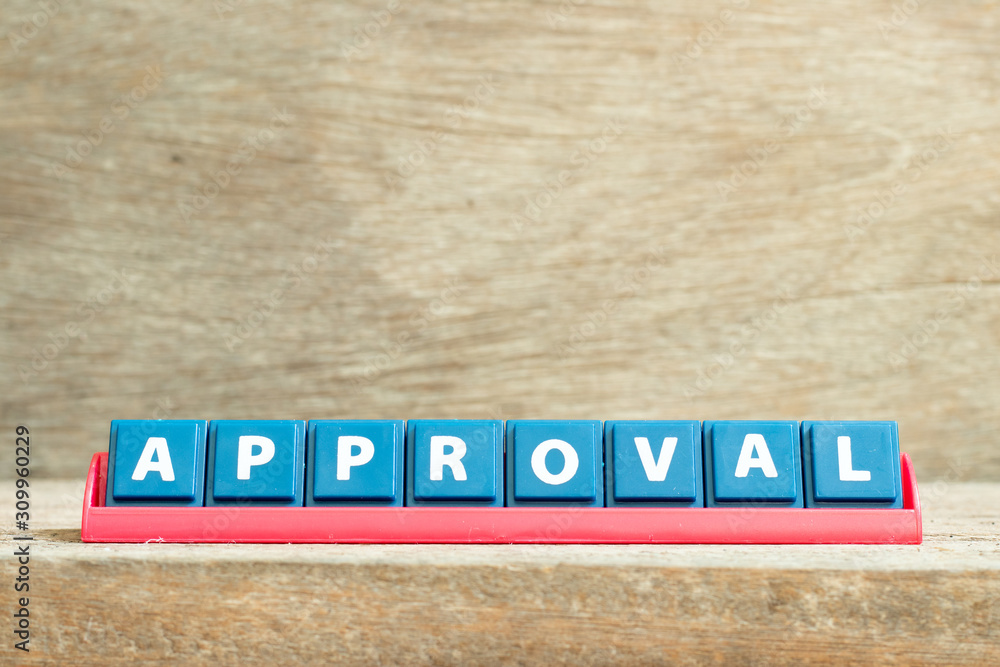 Fototapeta premium Tile letter on red rack in word approval on wood background