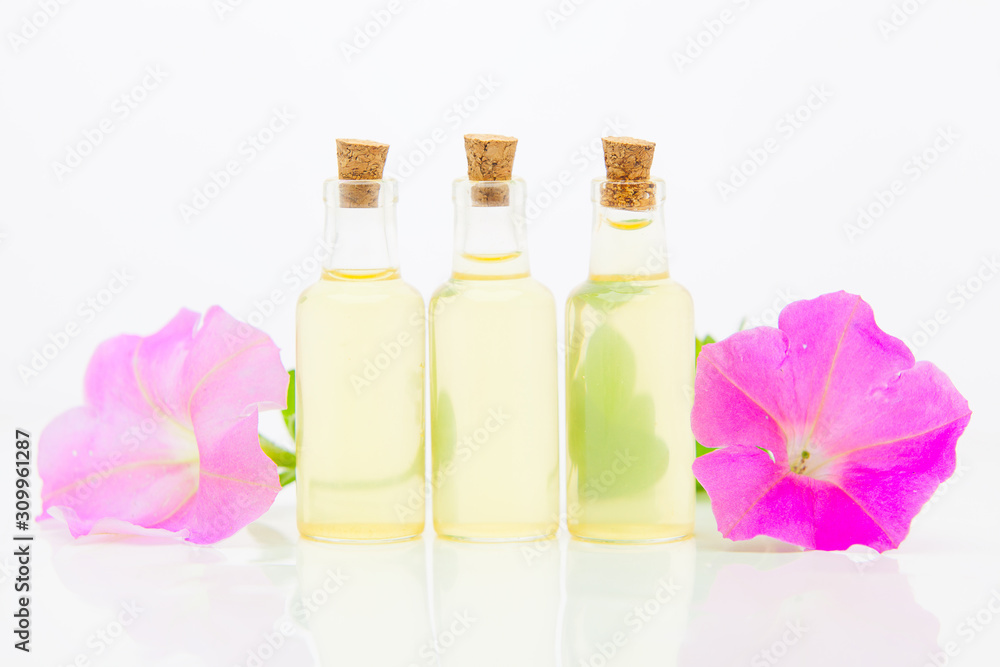 mallow essential oil in beautiful bottle on White background mallow essential oil in beautiful bottle on White background