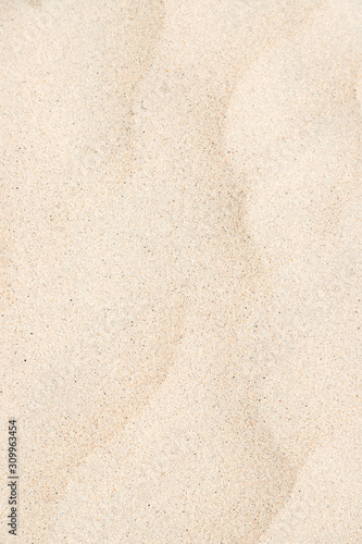 Soft white sand on the beach for texture background, have some small slope on surface - vertical