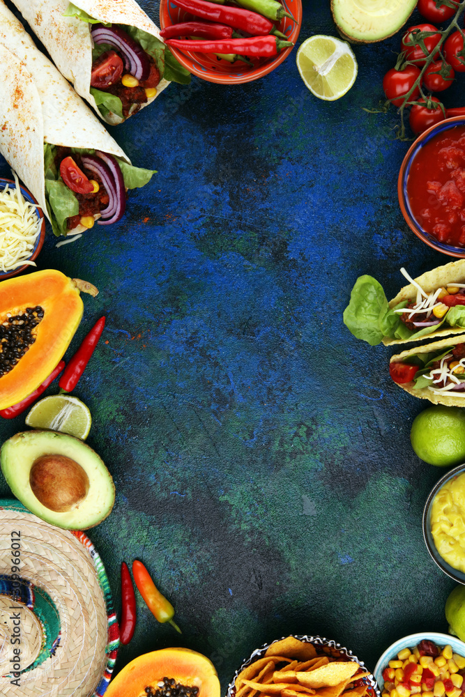 Mexican food mix with nachos copyspace frame colorful background Mexico