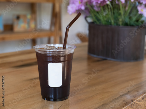 ice black coffee on wood table in the cafe photo