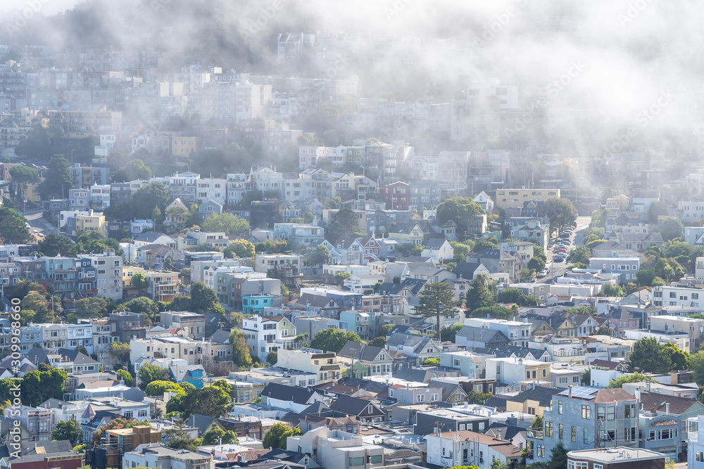 Fog over San Franciosco houses in California.