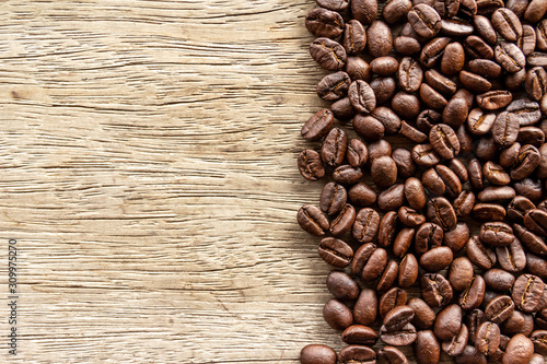 coffee beans on wooden background © tendo23