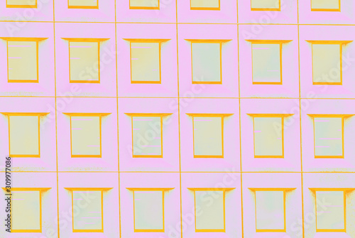 Pale pink wall and yellow orange windows pattern, abstract background © kvitkanastroyu