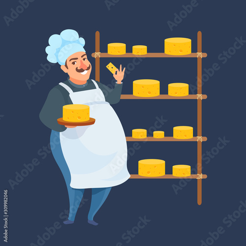 Smiling cheesemaker with a block of cheese on a tray. Happy man in an apron, hat, work uniform. Shelf with cheese heads on a dark background.