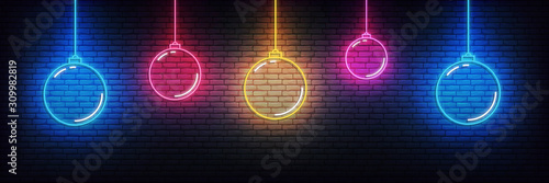 Christmas ball neon background. Set of realistic colorful Xmas glowing decorations