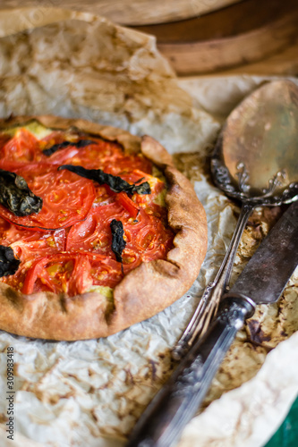 galeta baking with tomatoes and ricotta basil photo