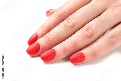 Woman hands, stylish red manicure isolated on white background, top view. Closeup. Healthcare concept