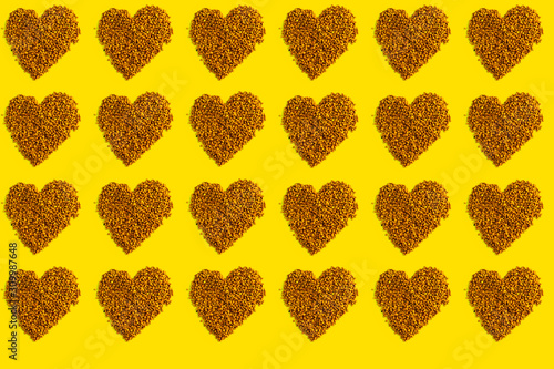 uckwheat heart on yellow background pattern isolate texture