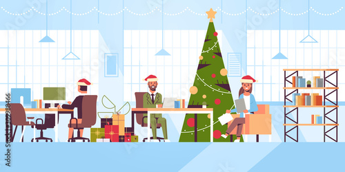 businesspeople in santa sitting at workplaces merry christmas happy new year holidays celebration concept modern open space office interior flat full length horizontal vector illustration
