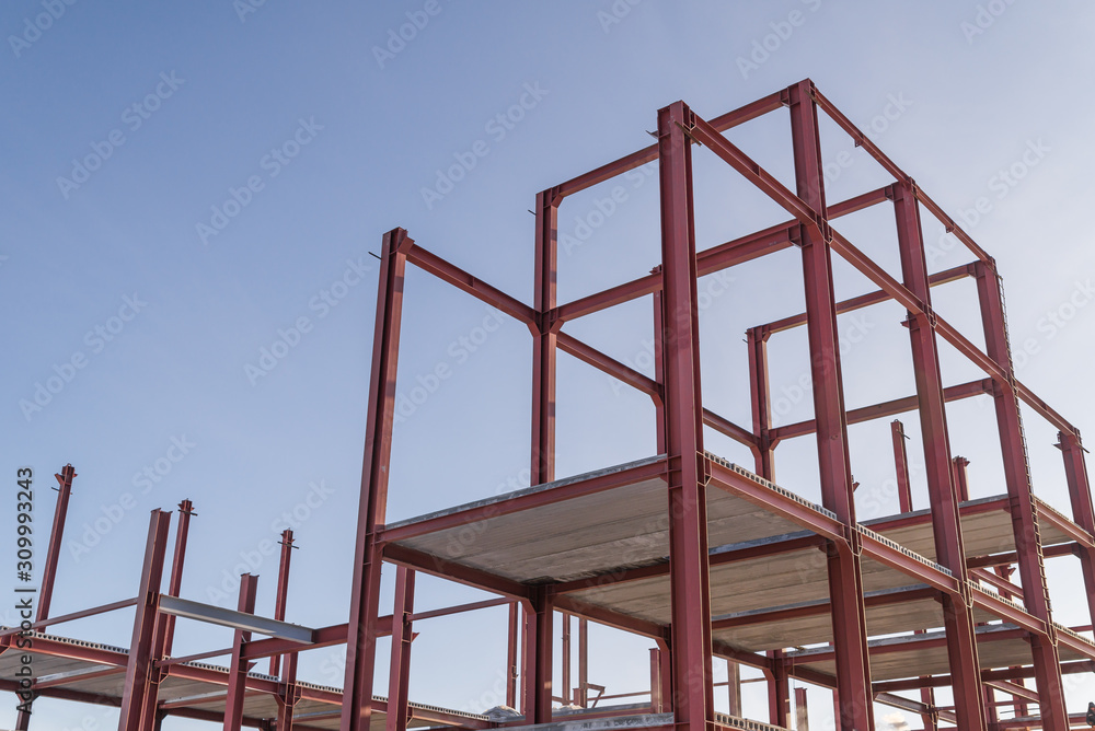 construction of the building of metal structures, metal frame roof. Steel design for the construction of the building against the sky. construction of the building of metal structures, metal frame roof. Steel design for the construction of the building against the sky.