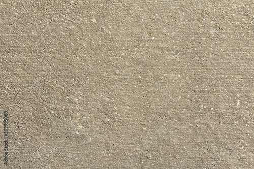 Fotografiet concrete road surface closeup crushed rock stone industry backdrop sandy sidewal