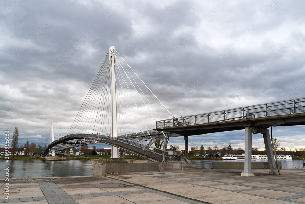 view of the Passerelle des Deux Rives Bridge over the Rhine River outside of Strasbourg