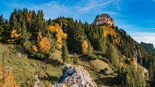 Beautiful alpine autumn or indian summer view at the famous Kampenwand, Aschau im Chiemgau, Bavaria, Germany photo