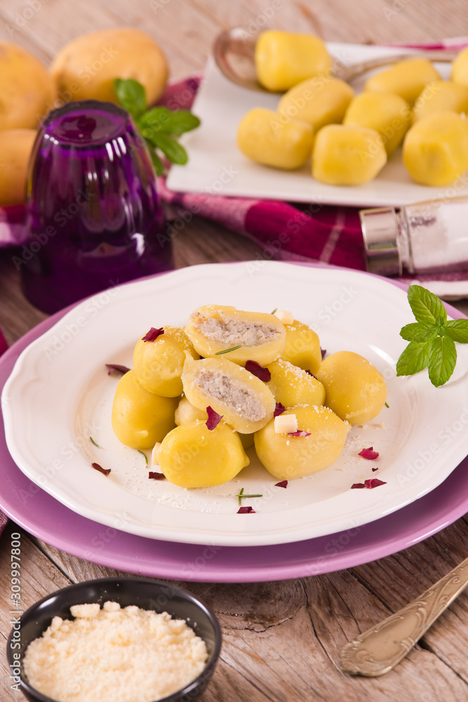 Potato gnocchi stuffed with radicchio and ricotta.