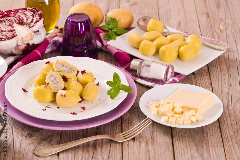 Potato gnocchi stuffed with radicchio and ricotta. Potato gnocchi stuffed with radicchio and ricotta.