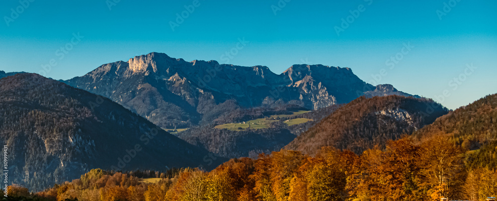 Beautiful alpine autumn or indian summer view with the famous Untersberg in the background near Berchtesgaden, Bavaria, Germany
