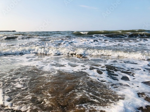 waves breaking on the beach