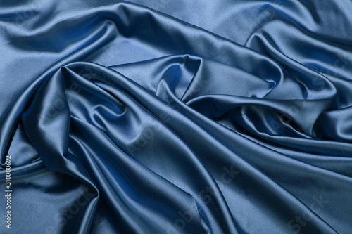 Blue color silk fabric. Abstract background.