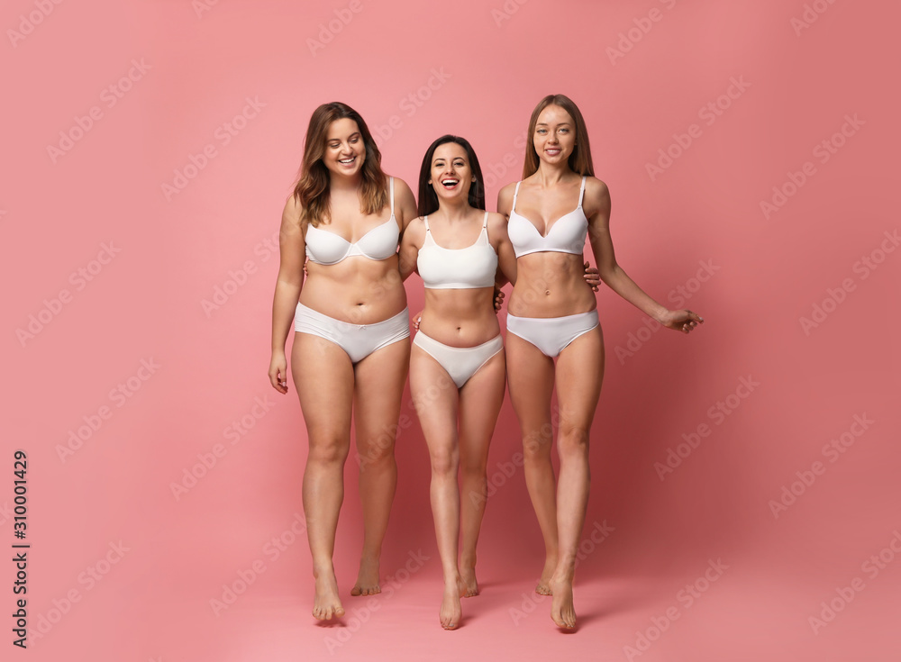 Group of women with different body types in underwear on pink background  Photos | Adobe Stock