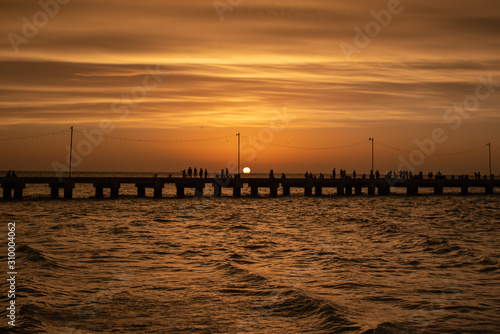 sunset over progreso pier