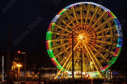 07.12.2019 Dresden. Christmas market in Dresden. A view of the Ferris wheel with a long exposure. Beautifully frozen wheel movement.