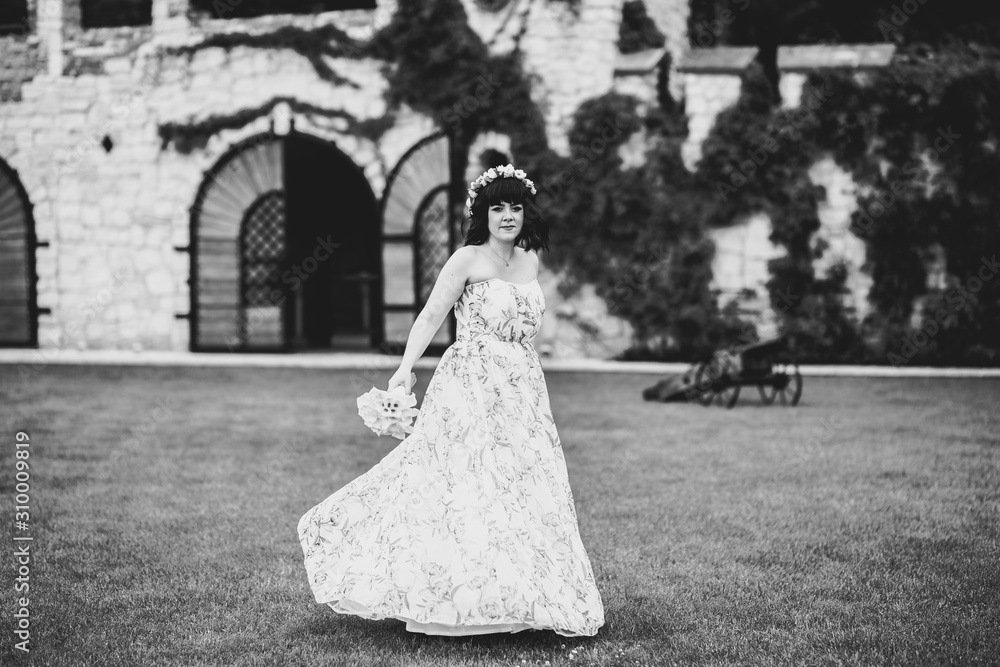 Bride holding big and beautiful wedding bouquet with flowers Bride holding big and beautiful wedding bouquet with flowers