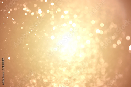 Abstract glod bokeh with glod background defocused.