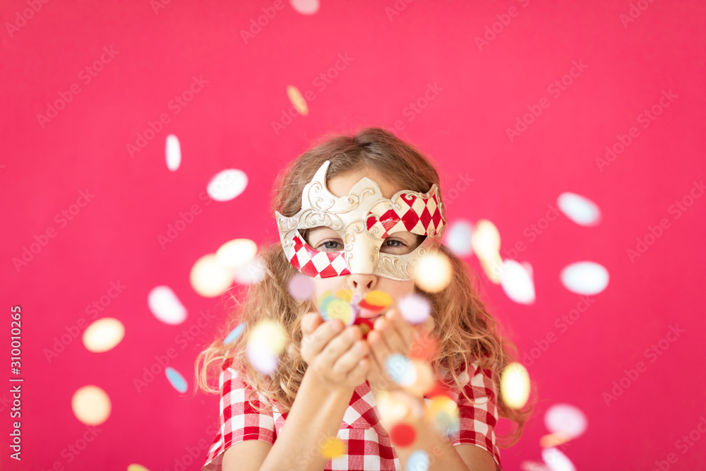 Fancy girl blowing confetti against pink bakground - obrazy, fototapety, plakaty 