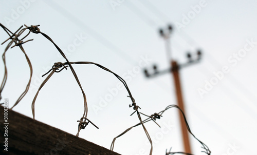  Barbed wire. Zone. Prison. Danger. Barbed metal fence.