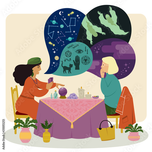 Fortune teller talking to a woman about astrology, spirits and occultism while using a crystal ball and other psychic tools.