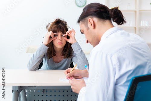 Photos Mentally ill woman patient during doctor visit