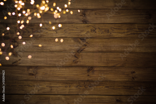 Christmas lights on old wood