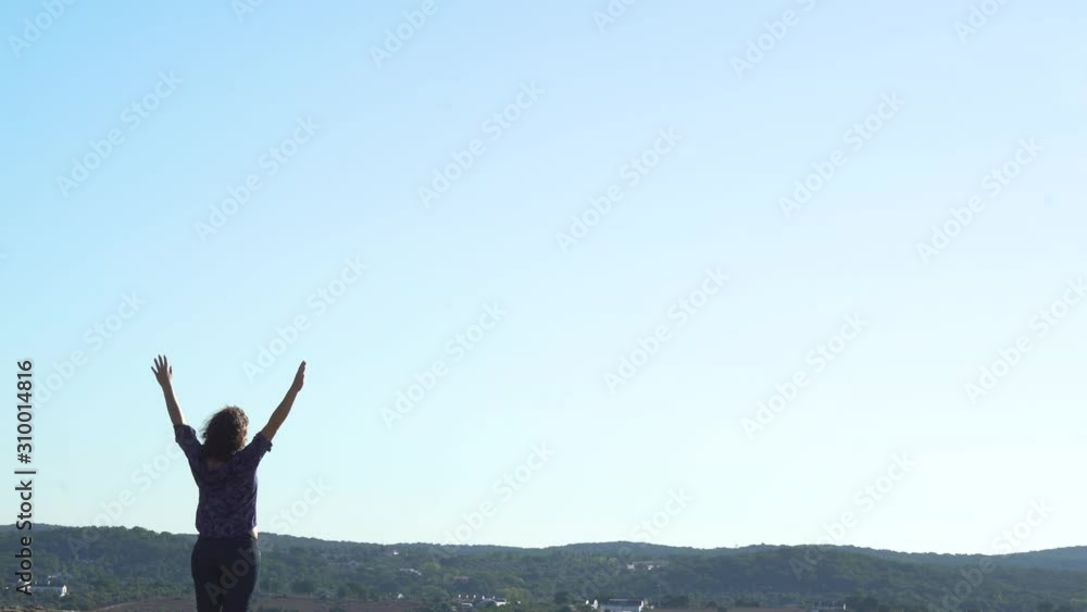 Woman on top of mountain Woman on top of mountain