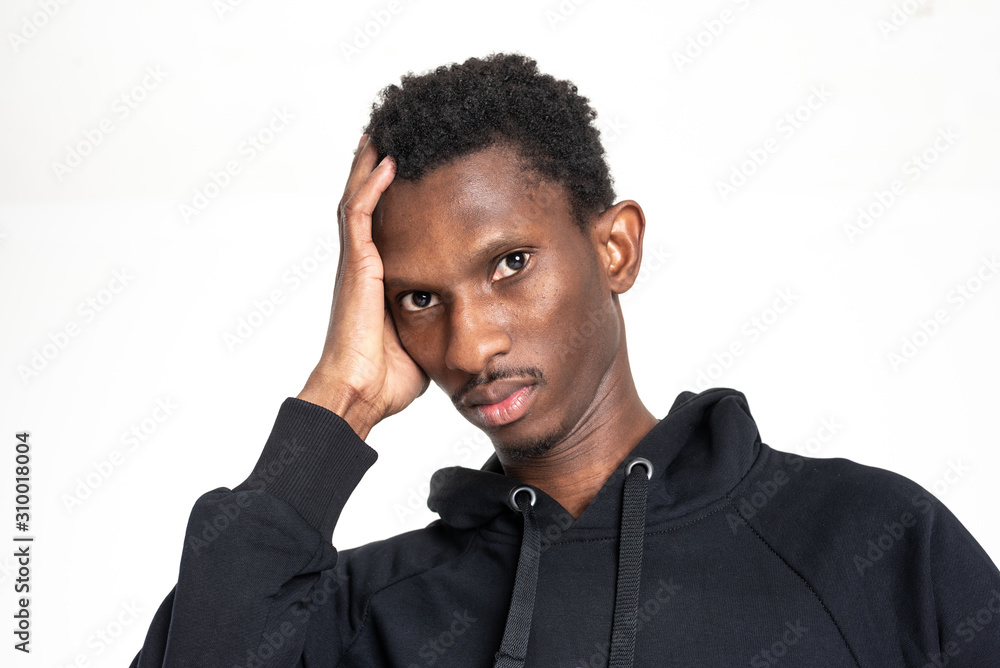 A black guy (man) in a black sweater touching himself A black guy (man) in a black sweater touching himself