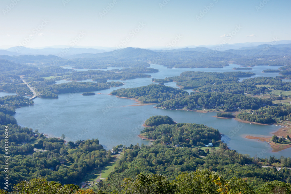 View on Lake Chatuge from Bell mountain. Hiawasse, Georgia, USA. On Bell mountain the rock are covered with spray paint.