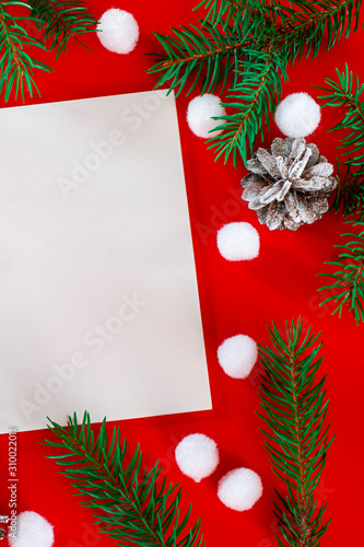Frame of Christmas decoration on red background top view