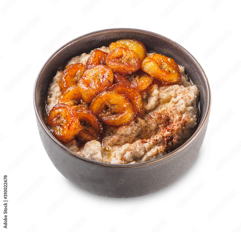 Oatmeal with fried banana. White isolated background