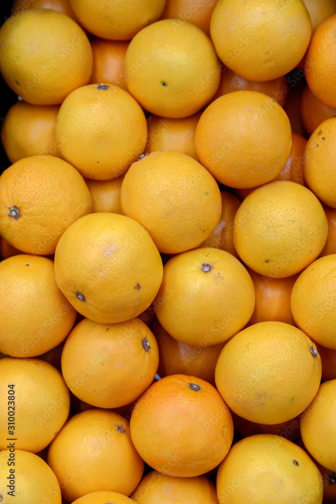 Oranges in the rack at the supermarket Oranges in the rack at the supermarket