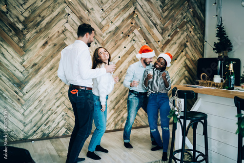 Christmas partner dance against wooden wall