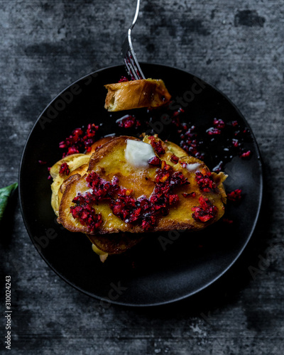 Obraz na plátně challah french toast from above with cranberry relish and maple syrup