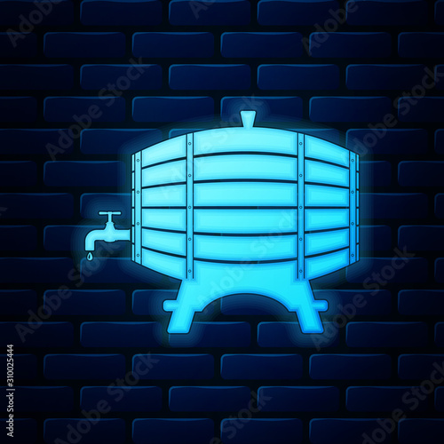 Glowing neon Wooden barrel on rack with stopcock icon isolated on brick wall background. Vector Illustration