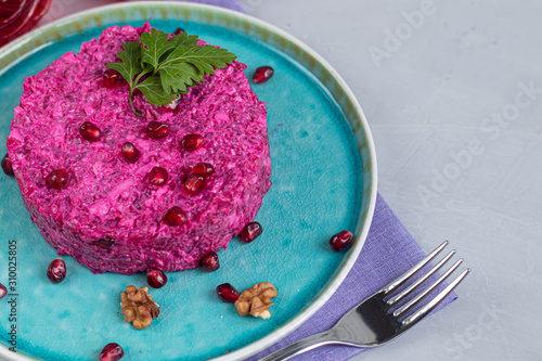 Holiday salad of beets and soft cheese in glasses. Added sesame seeds and chanok. photo