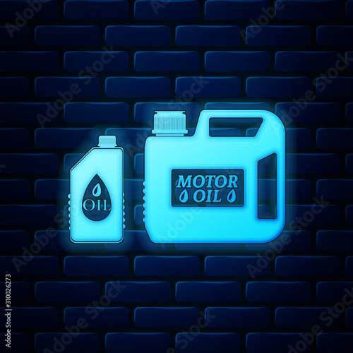 Glowing neon Plastic canister for motor machine oil icon isolated on brick wall background. Oil gallon. Oil change service and repair. Engine oil sign. Vector Illustration