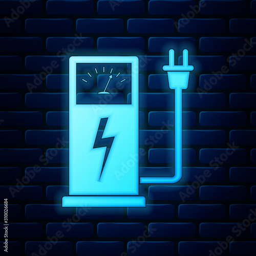 Glowing neon Electric car charging station icon isolated on brick wall background. Eco electric fuel pump sign. Vector Illustration