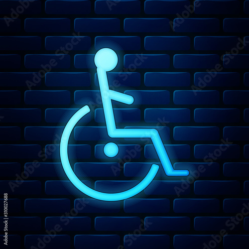 Glowing neon Disabled handicap icon isolated on brick wall background. Wheelchair handicap sign. Vector Illustration