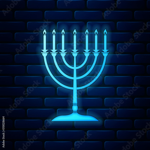 Glowing neon Hanukkah menorah icon isolated on brick wall background. Religion icon. Hanukkah traditional symbol. Holiday religion, jewish festival of Lights. Vector Illustration
