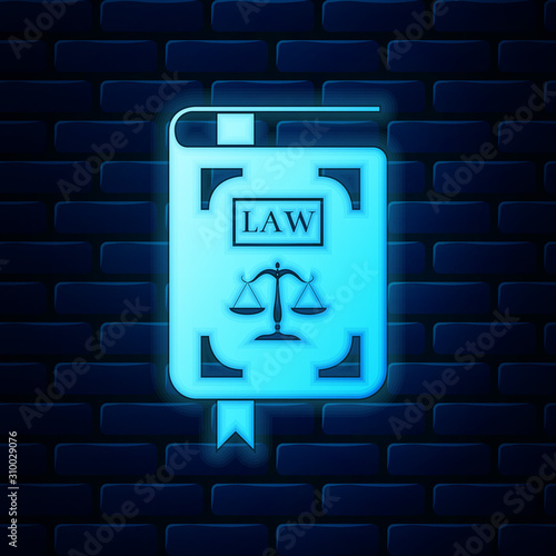 Glowing neon Law book statute book with scales of justice icon isolated on brick wall background. Vector Illustration