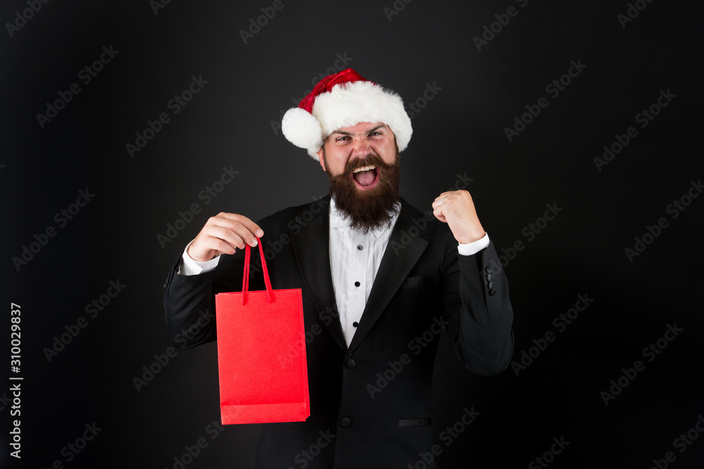Just in time for boxing day. Happy manager hold paperbag with winner gesture. Bearded man celebrate boxing day. New year. Merry Christmas. Boxing day sale. Most wanted gift for Boxing day, copy space Just in time for boxing day. Happy manager hold paperbag with winner gesture. Bearded man celebrate boxing day. New year. Merry Christmas. Boxing day sale. Most wanted gift for Boxing day, copy space