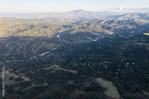 The last light of day illuminates the peaceful hills of the East Bay, just east of Oakland, Berkeley, and El Cerrito in the San Francisco Bay Area. © ead72